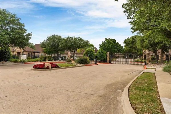 a view of a pathway with a patio