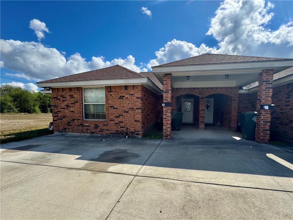 201 Cecilia Street Alice, TX 78332 - Photo 1 of 14 a view of a chairs and tables in the patio
