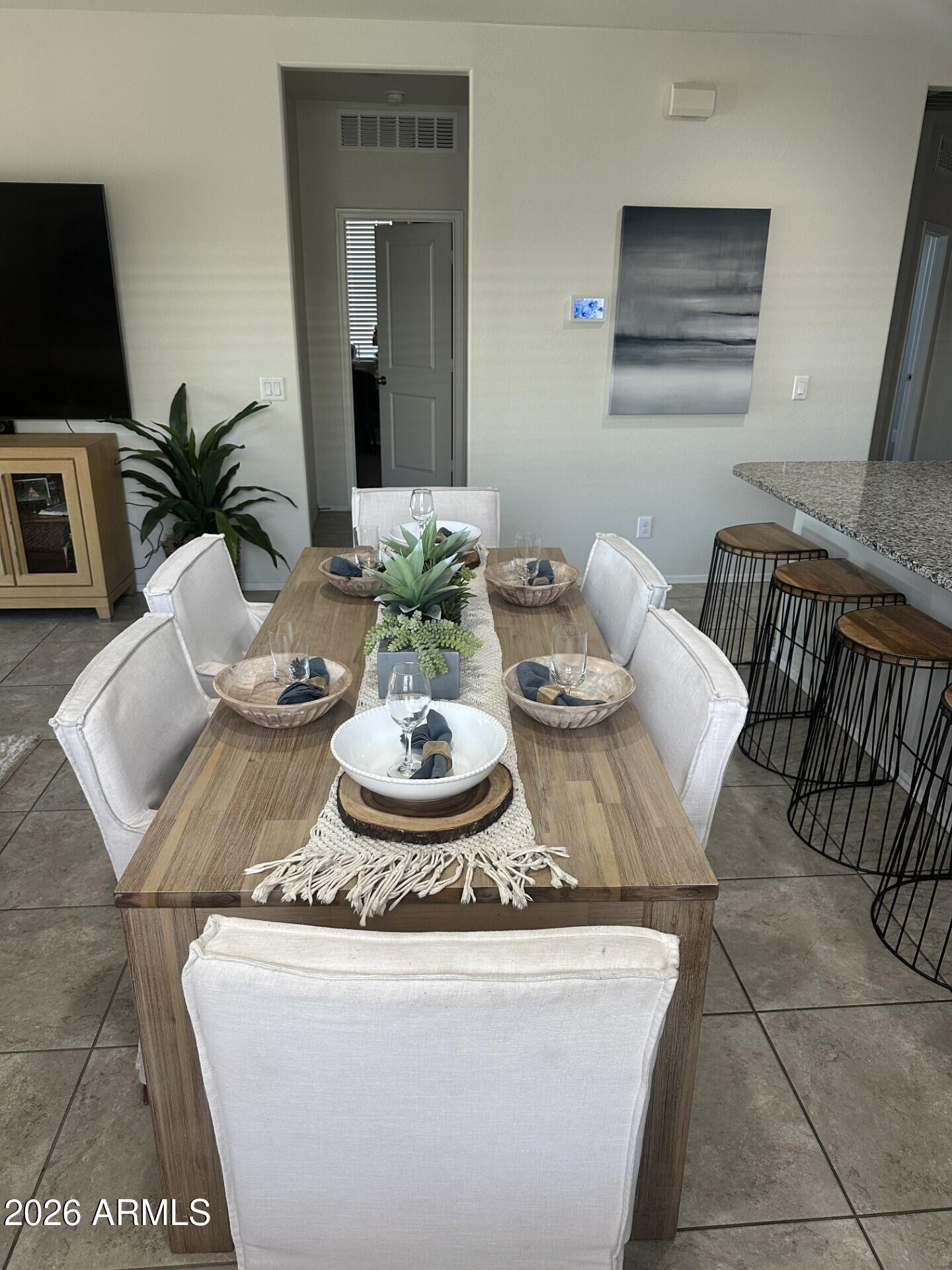 7851 West Riverside Avenue Phoenix, AZ 85043 - Photo 5 of 40 a dining room with furniture