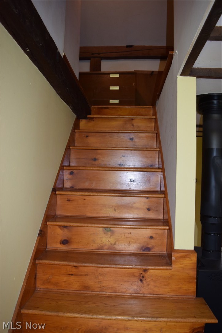 14330 Georgia Road Middlefield, OH 44062 - Photo 14 of 32 Finished wood stairs leading to the second floor.