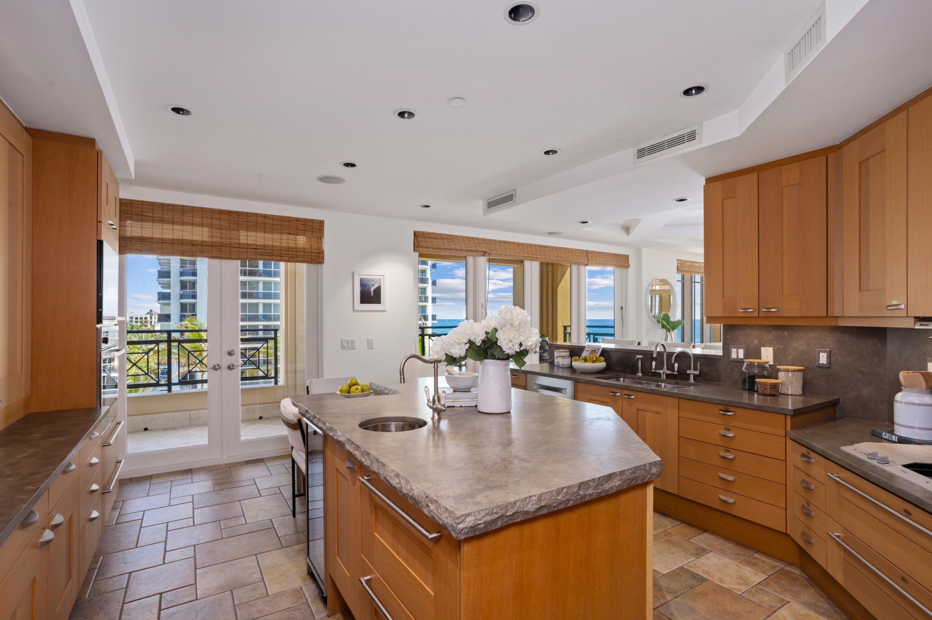 400 South Ocean Boulevard, Unit R12 Boca Raton, FL 33432 - Photo 12 of 41 KITCHEN TO BALCONY