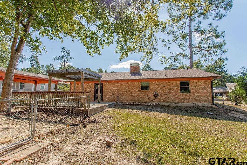 213 Treetop Lane Hideaway, TX 75771 - Photo 40 of 48 a front view of a house with a yard