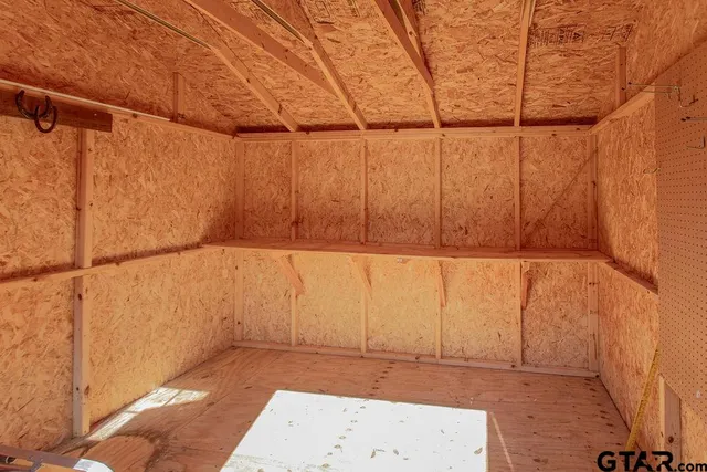 a balcony view with a garden space