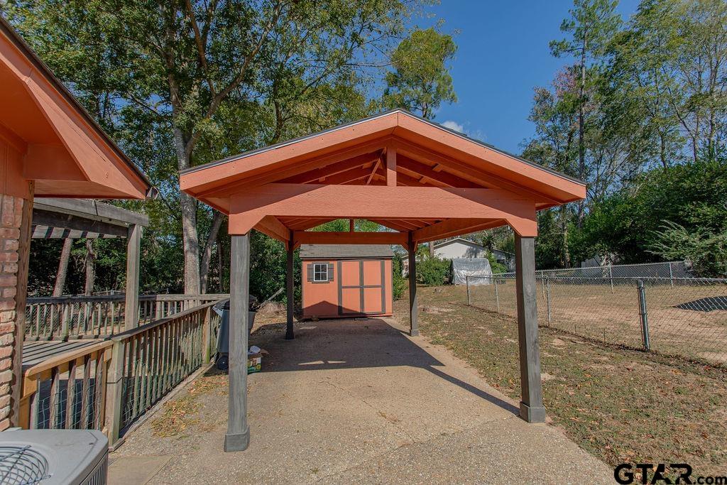 213 Treetop Lane Hideaway, TX 75771 - Photo 46 of 48 a balcony view with a garden space