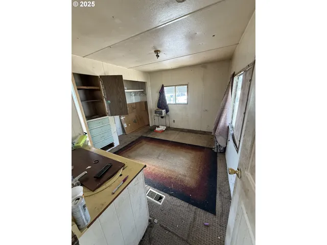 a view of kitchen and utility room