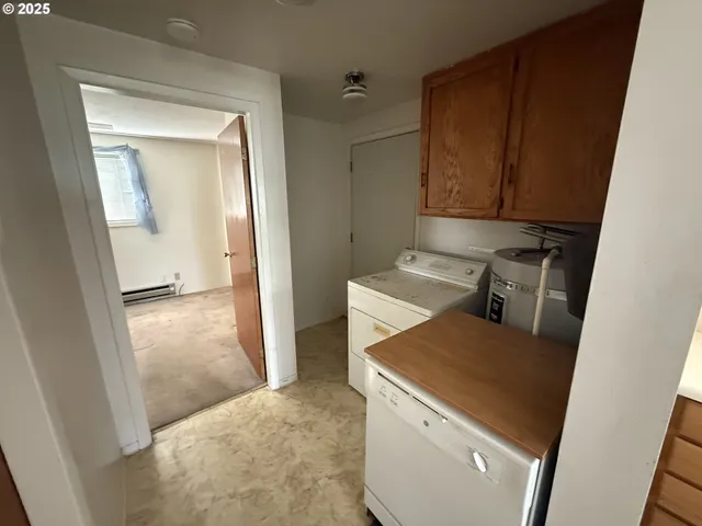a view of kitchen and utility room