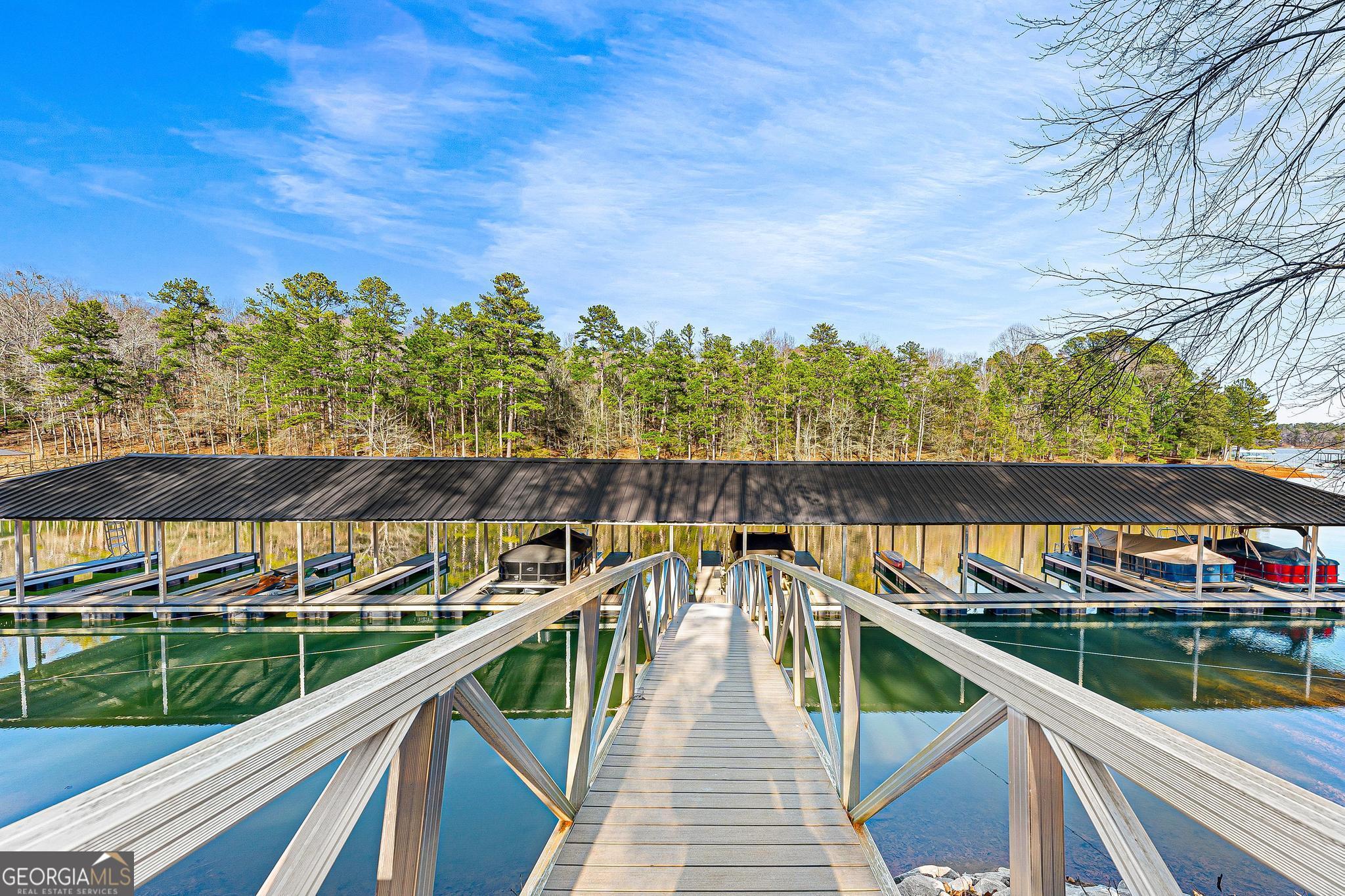 395 Tom Cobb Drive Hartwell, GA 30643 - Photo 21 of 24 a view of a balcony with wooden floor and fence