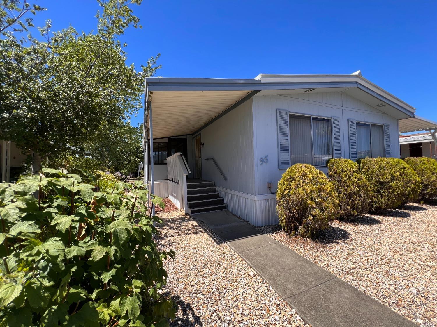 95 Anacapa Drive Santa Rosa, CA 95403 - Photo 1 of 45 a view of a house with a flower garden