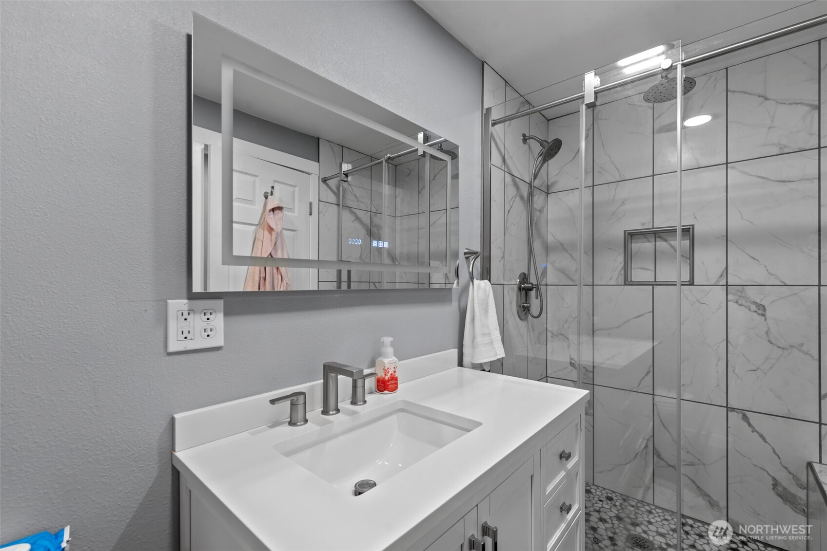 1750 Methow Street Wenatchee, WA 98801 - Photo 12 of 33 a bathroom with a sink shower and a mirror