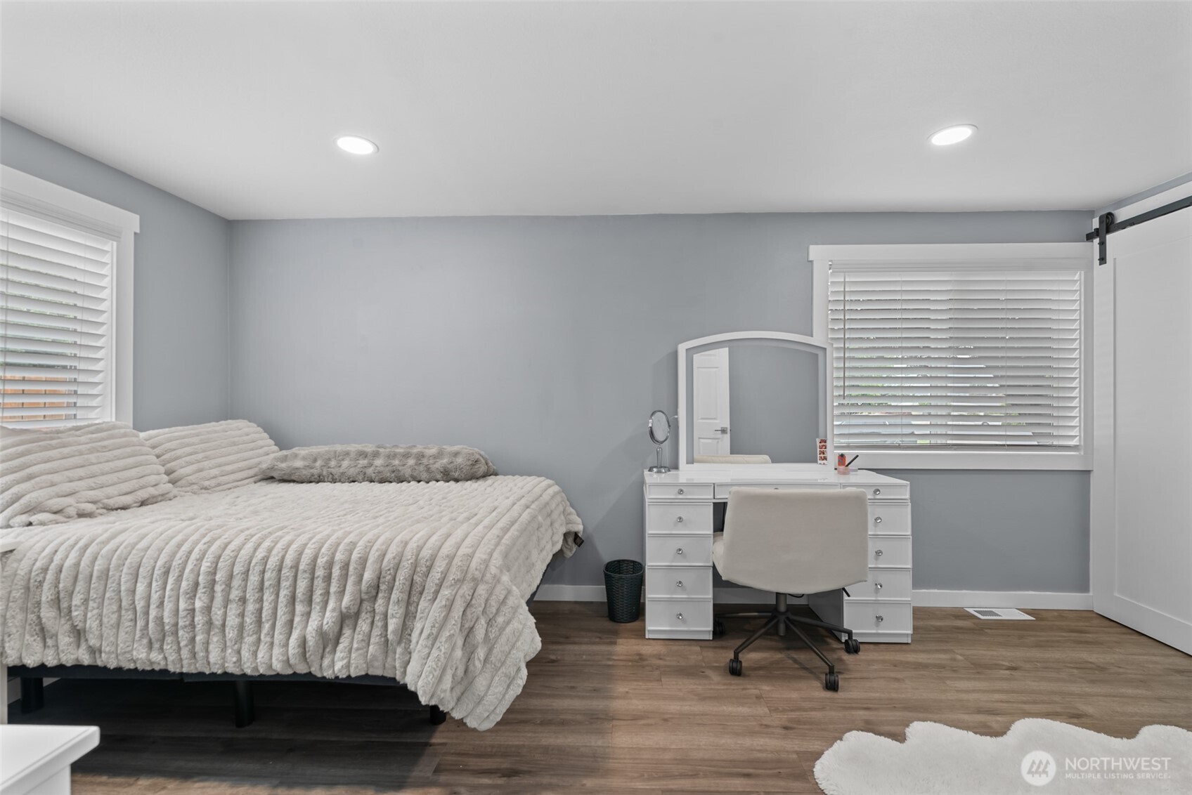 1750 Methow Street Wenatchee, WA 98801 - Photo 13 of 33 a bedroom with a bed a table and a window
