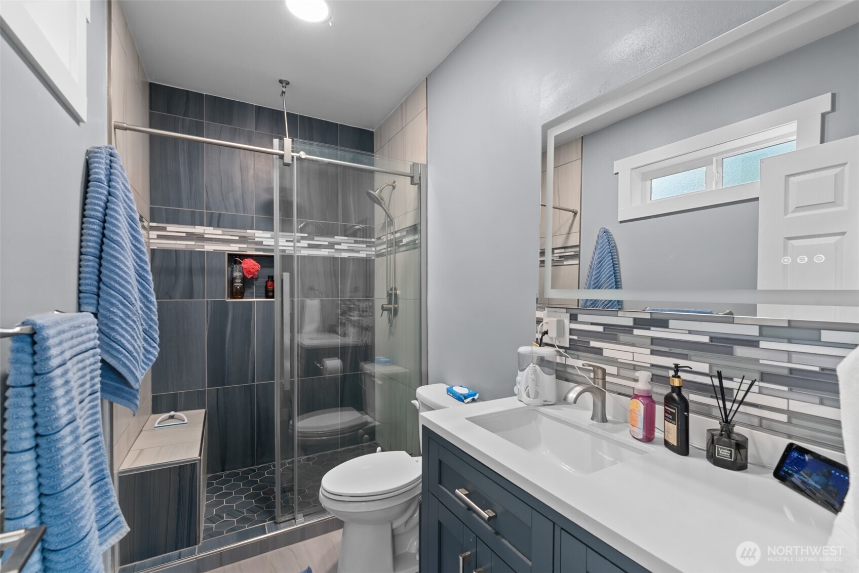 1750 Methow Street Wenatchee, WA 98801 - Photo 26 of 33 a bathroom with a sink toilet and shower