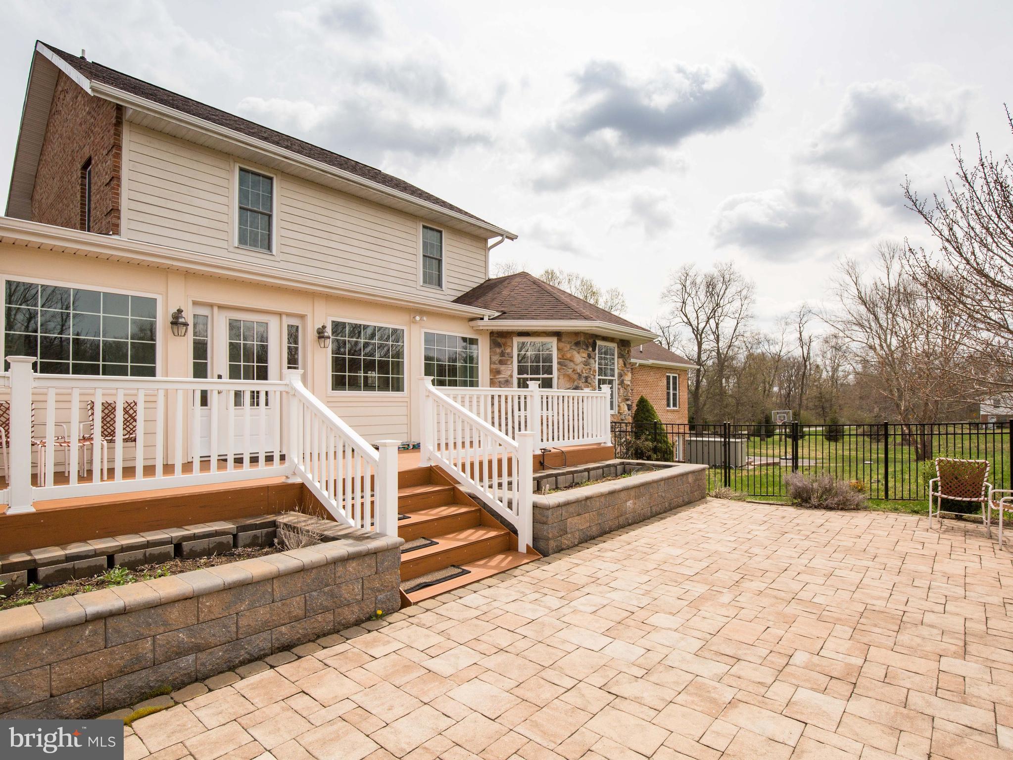 6485 Summit Point Road Charles Town, WV 25414 - Photo 4 of 71 rear patio and deck face West for evening sunsets