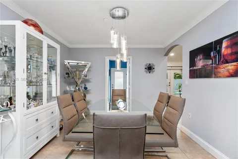 a bathroom with a glass door shower