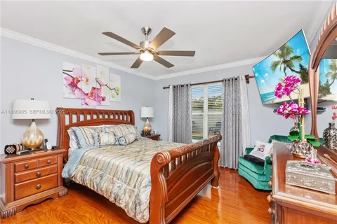 a bathroom with a granite countertop sink mirror and toilet