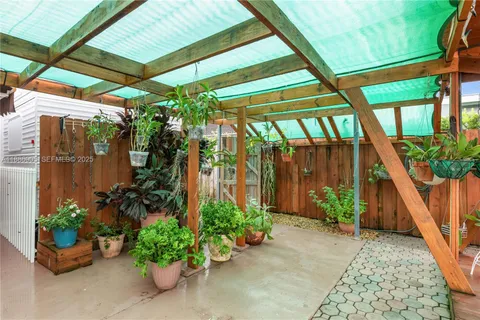 a view of a backyard with garden