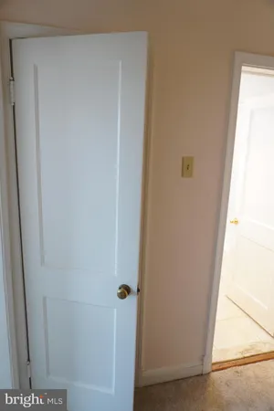 a bathroom with a sink a mirror and a toilet
