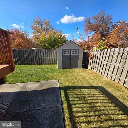 a view of a backyard with a garden