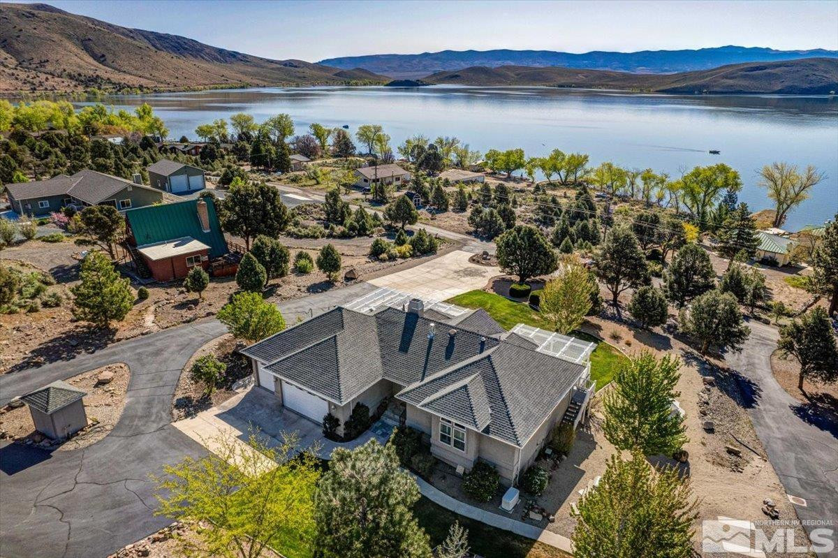 2034 Comstock Drive Gardnerville, NV 89410 - Photo 2 of 40 a view of a lake from a city