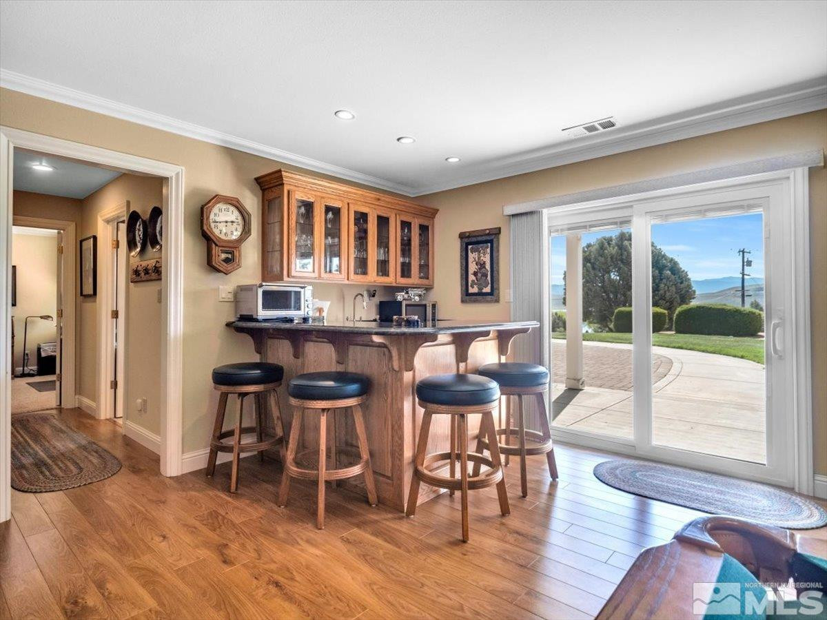 2034 Comstock Drive Gardnerville, NV 89410 - Photo 26 of 40 a living room with furniture and a large window