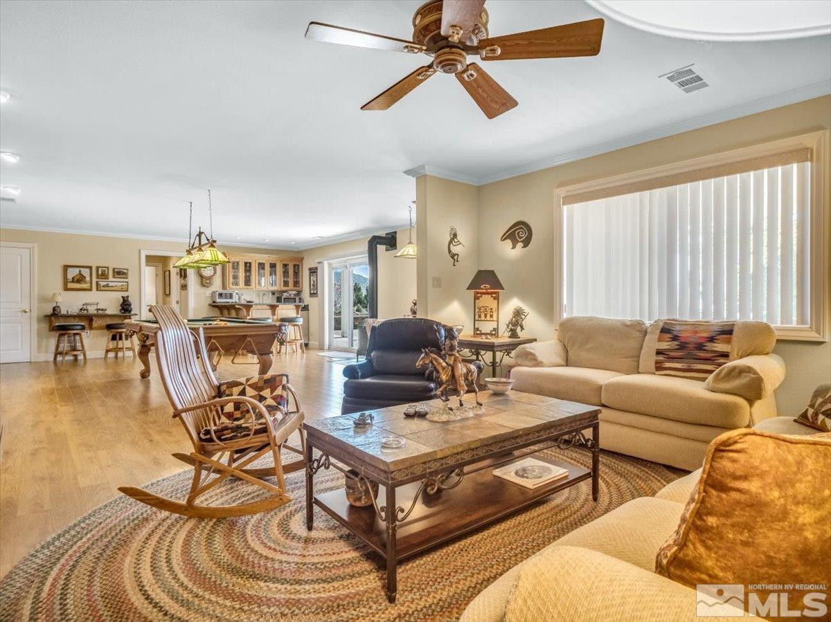 2034 Comstock Drive Gardnerville, NV 89410 - Photo 28 of 40 a living room with furniture and a large window