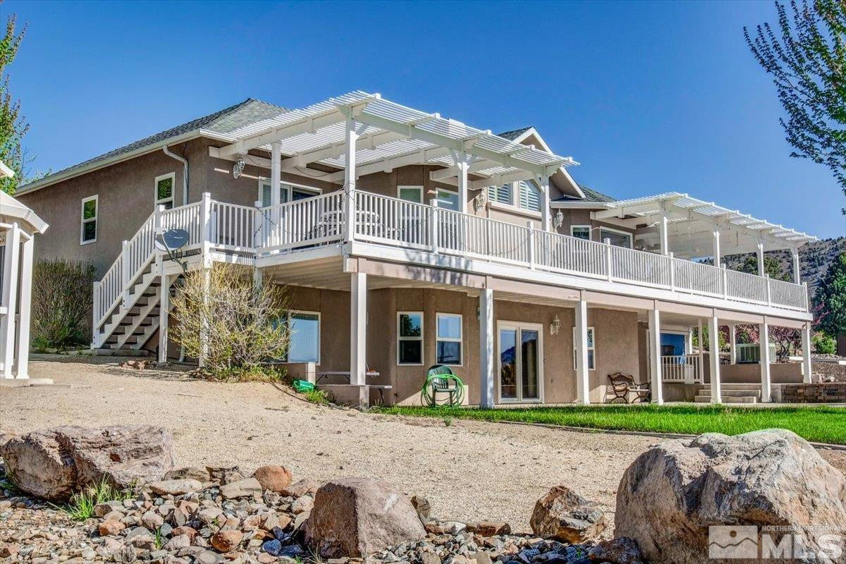 2034 Comstock Drive Gardnerville, NV 89410 - Photo 32 of 40 front view of a building with a yard