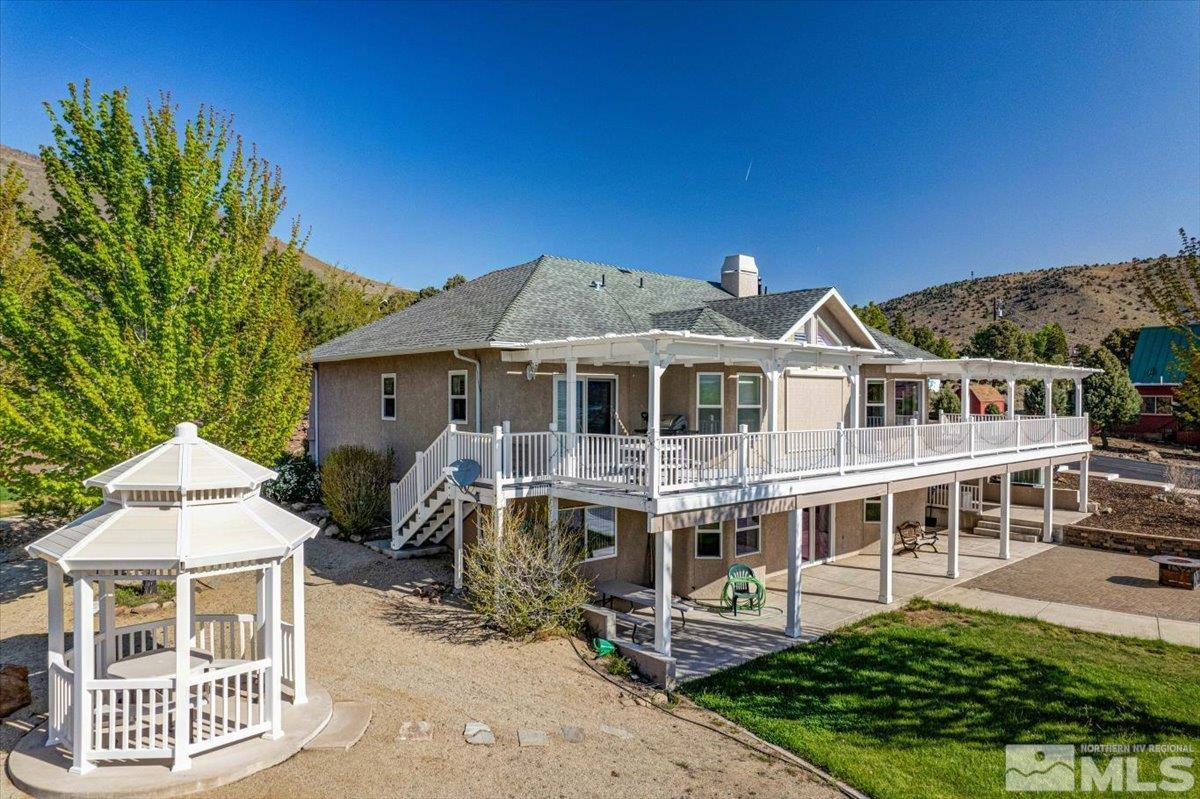 2034 Comstock Drive Gardnerville, NV 89410 - Photo 33 of 40 a front view of a house with a garden