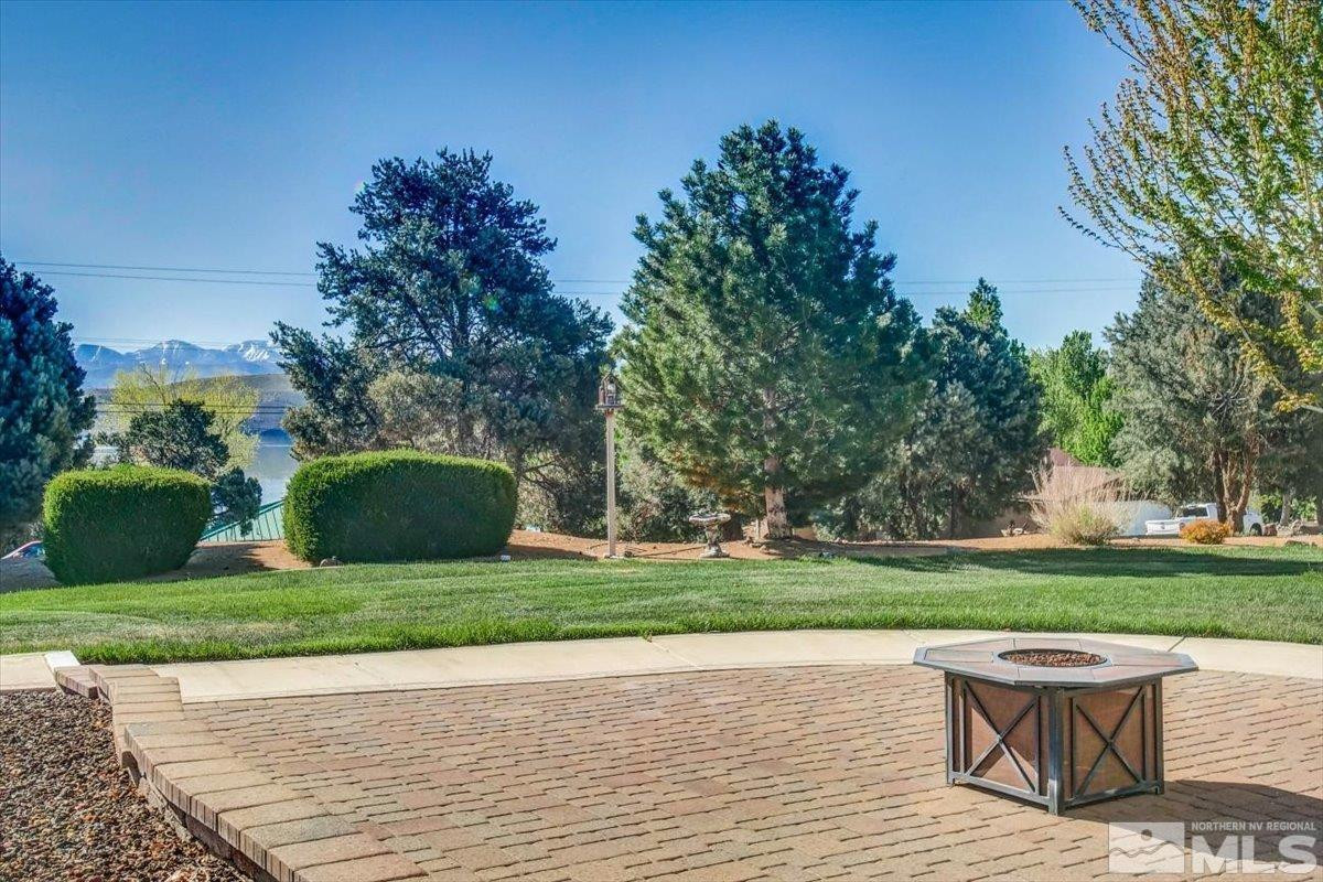 2034 Comstock Drive Gardnerville, NV 89410 - Photo 34 of 40 a view of a chair and table on the wooden floor
