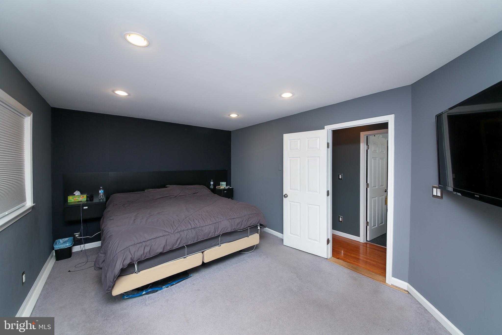 685 Union Road Quakertown, PA 18951 - Photo 15 of 44 a spacious bedroom with a bed and a television