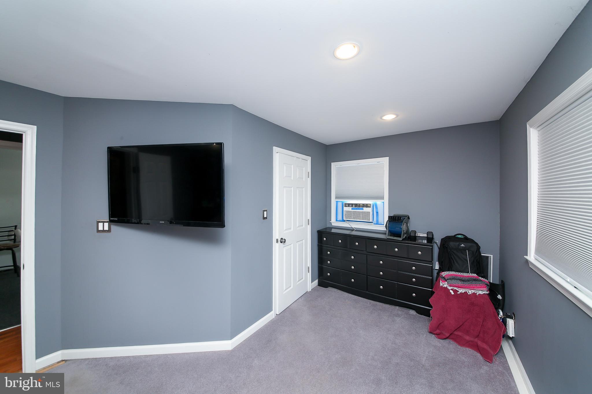 685 Union Road Quakertown, PA 18951 - Photo 16 of 44 a living room with furniture and a flat screen tv