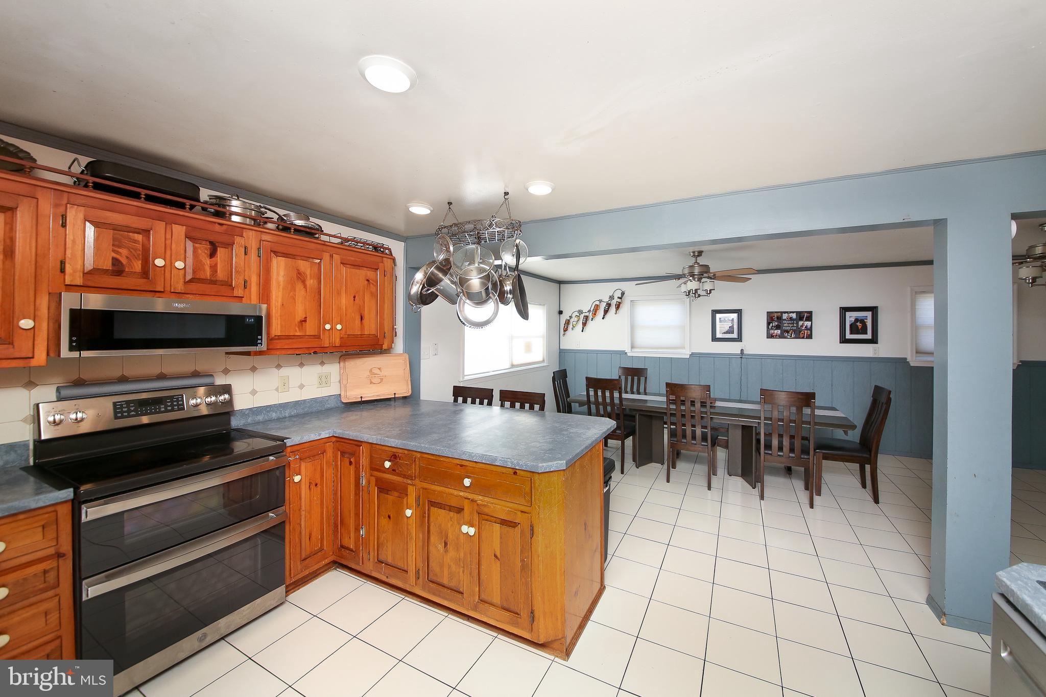 685 Union Road Quakertown, PA 18951 - Photo 6 of 44 a kitchen with stainless steel appliances granite countertop a stove and a sink