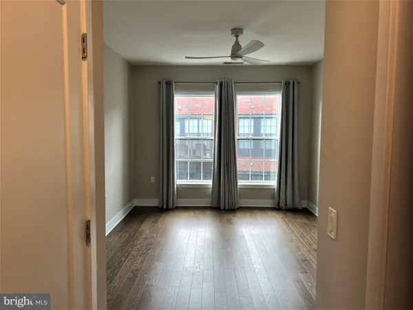 a view of livingroom with hardwood floor and window