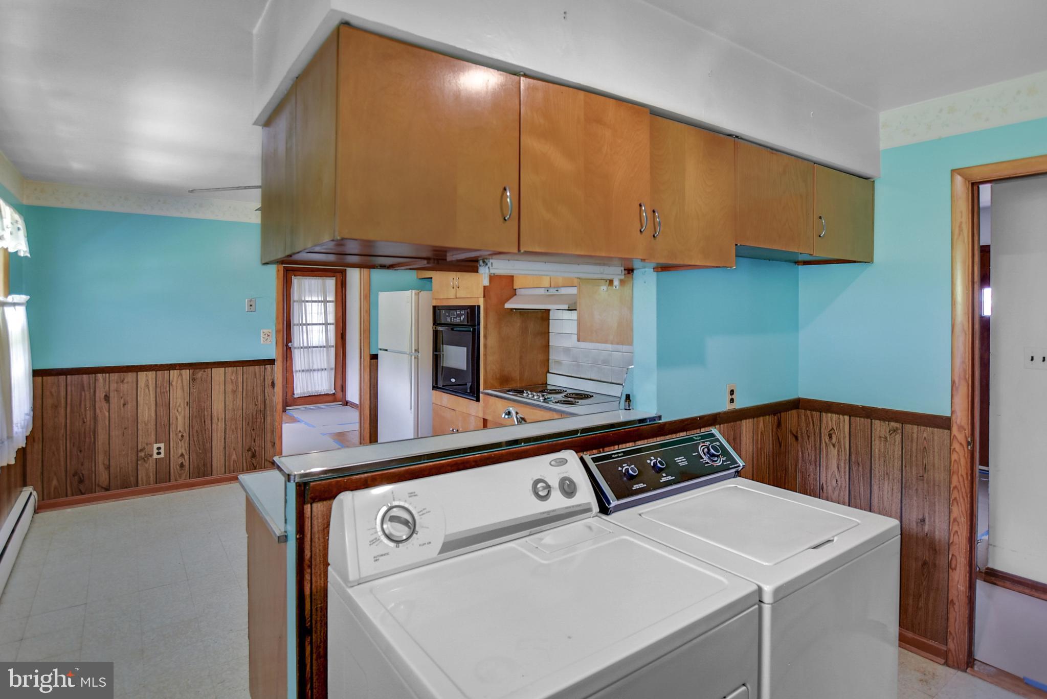 14 Friendship Road Friendship, MD 20758 - Photo 12 of 38 Washer/Dryer off Kitchen