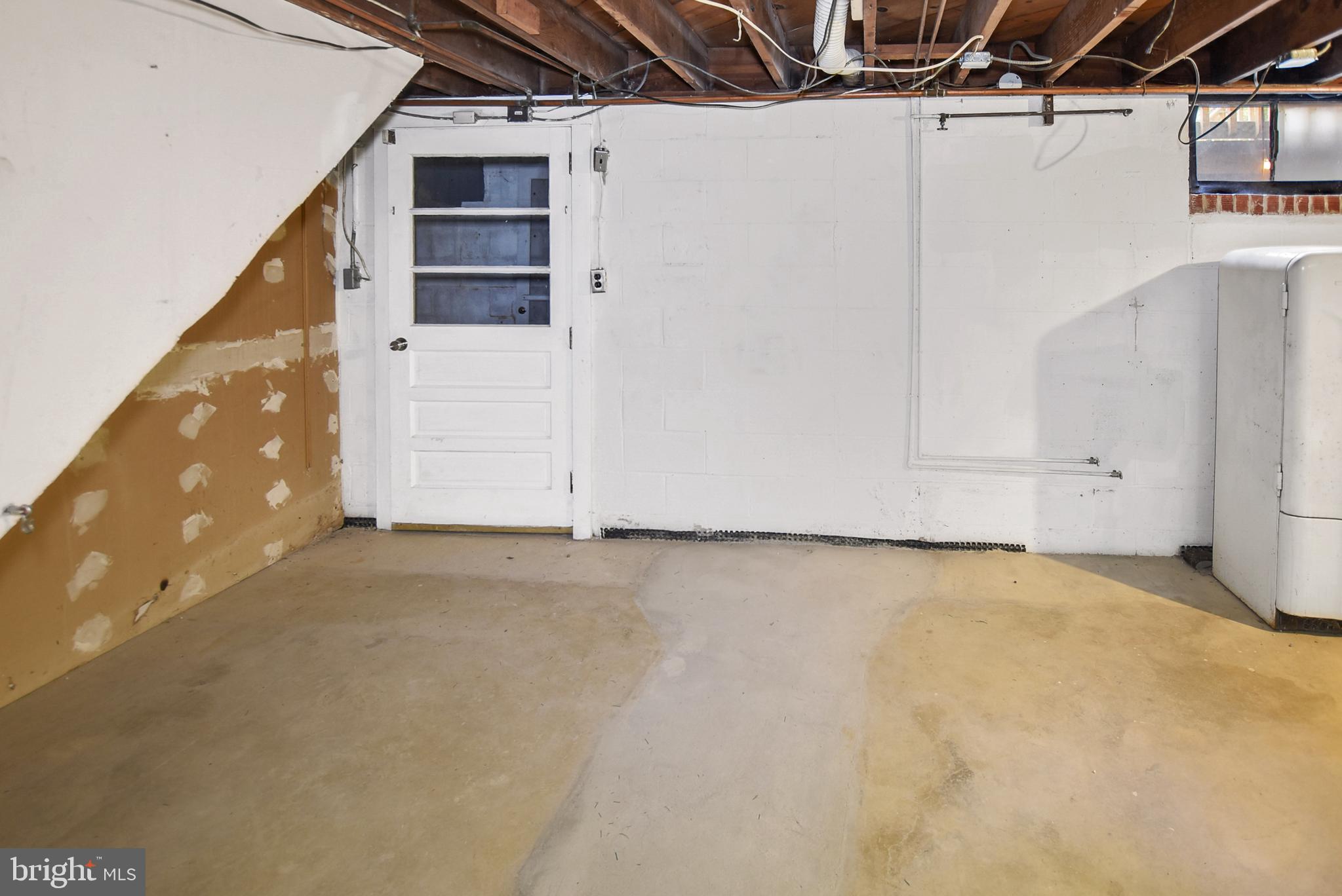 14 Friendship Road Friendship, MD 20758 - Photo 36 of 38 Unfinished basement with walk-up exit