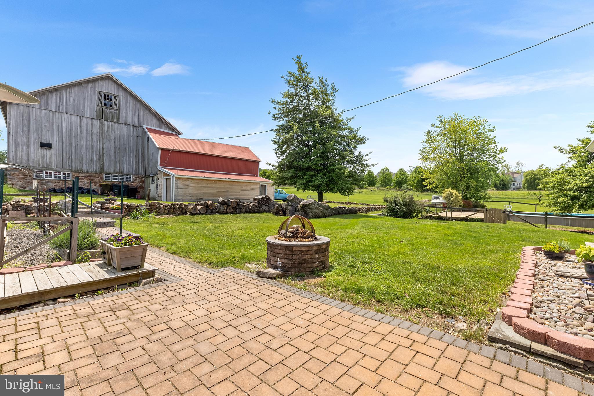 3047 Yellow Springs Road Malvern, PA 19355 - Photo 15 of 68 a front view of a house with garden