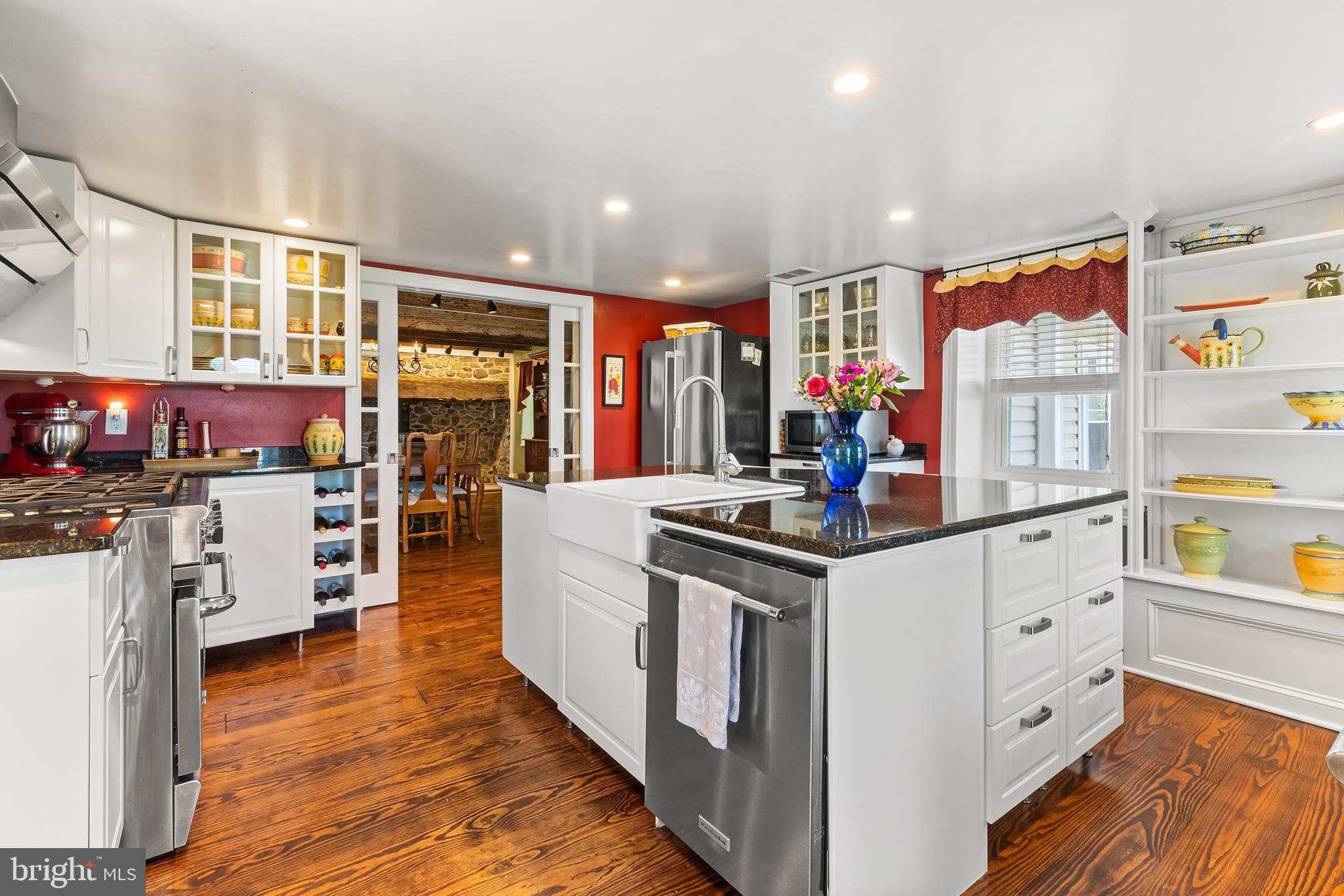 3047 Yellow Springs Road Malvern, PA 19355 - Photo 2 of 68 a kitchen that has a lot of cabinets in it and wooden floors