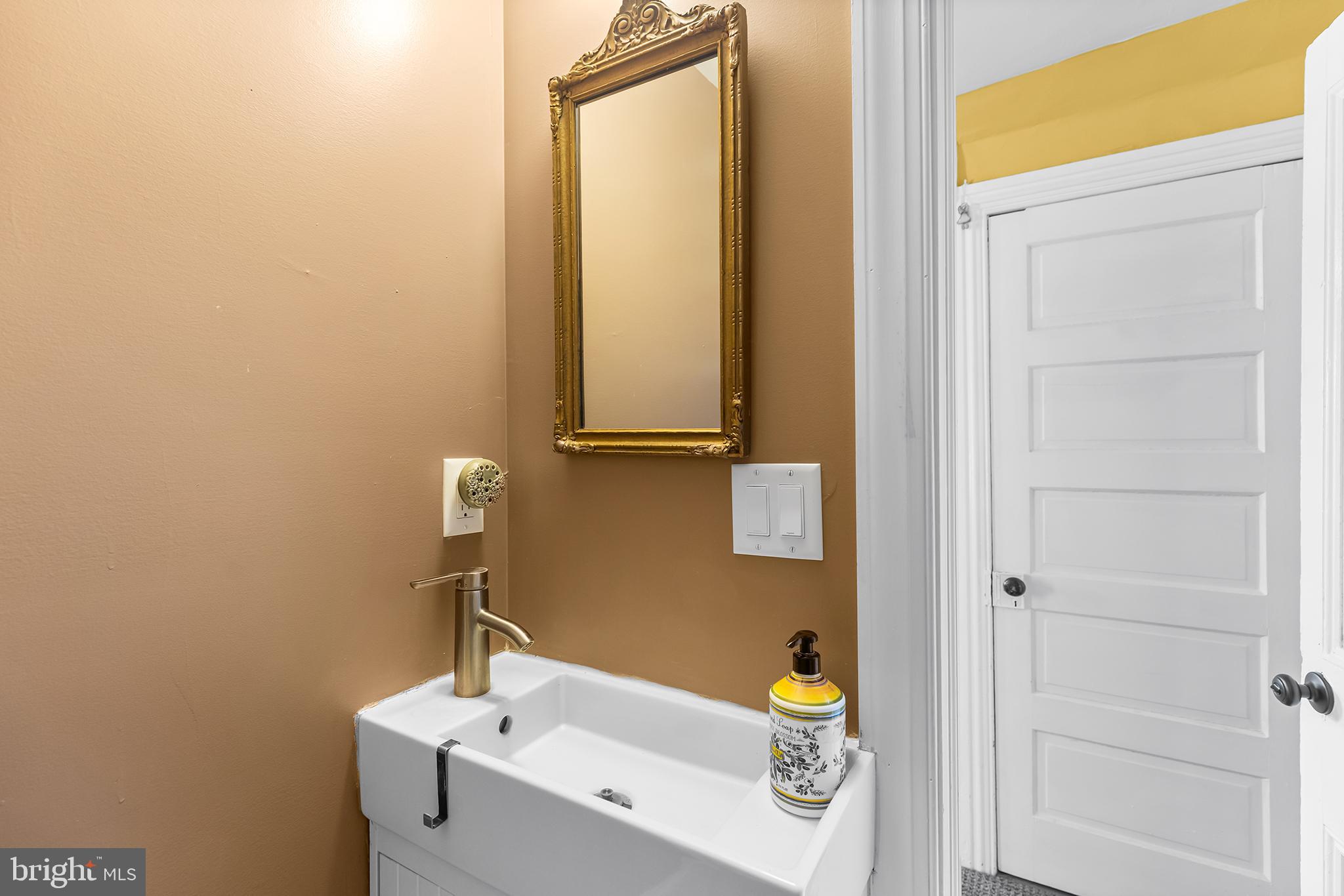 3047 Yellow Springs Road Malvern, PA 19355 - Photo 24 of 68 a bathroom with a sink and a tub