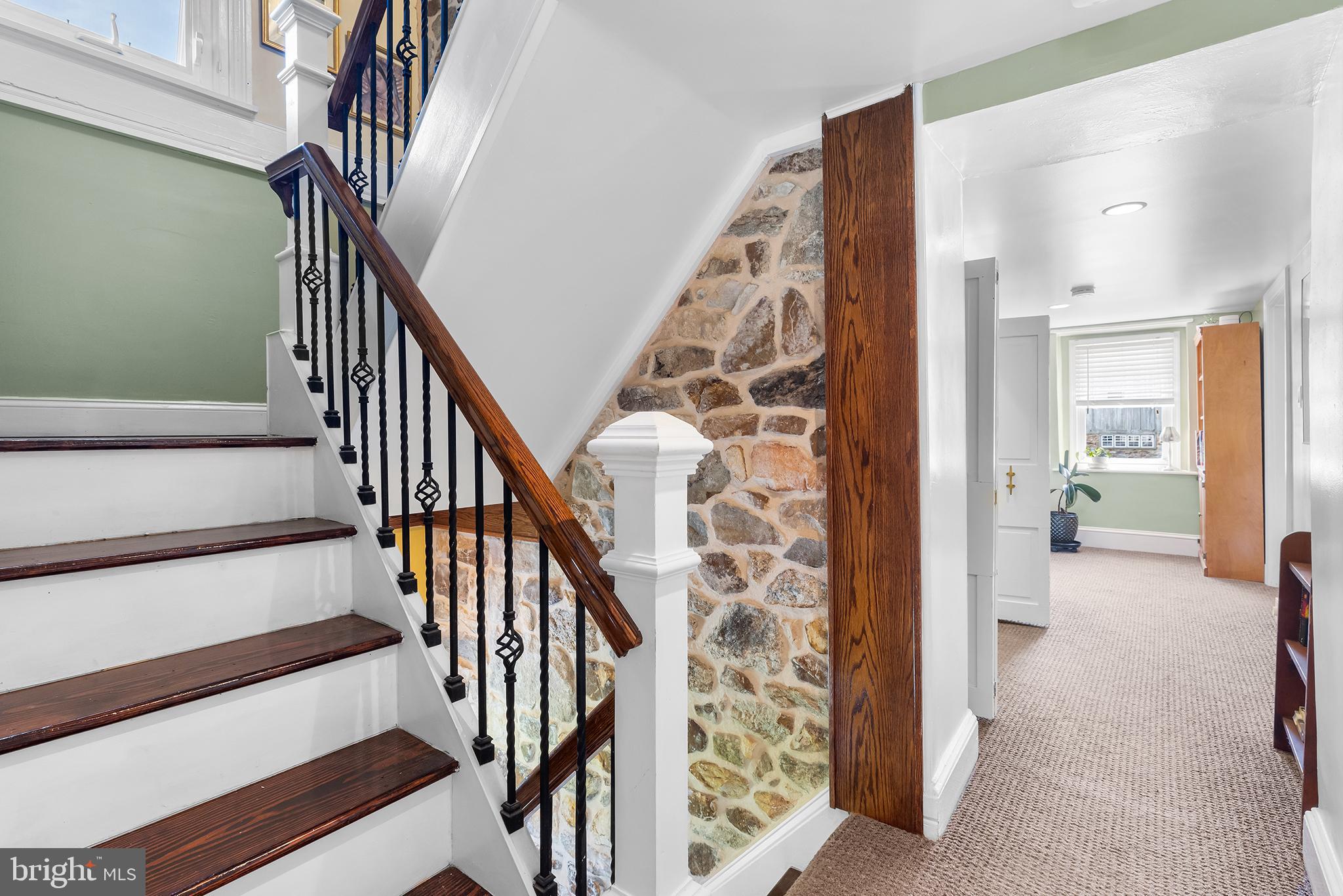 3047 Yellow Springs Road Malvern, PA 19355 - Photo 25 of 68 a view of an entryway with wooden floor and stairs