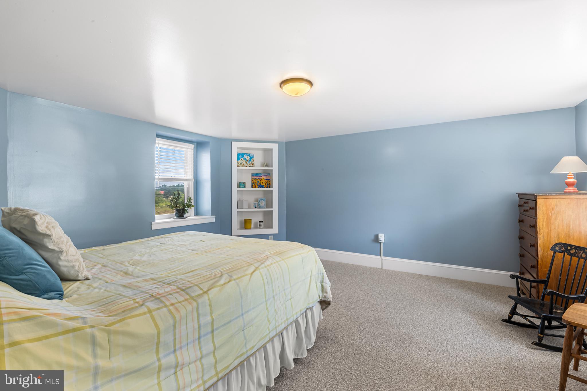 3047 Yellow Springs Road Malvern, PA 19355 - Photo 32 of 68 a bedroom with a bed and a window