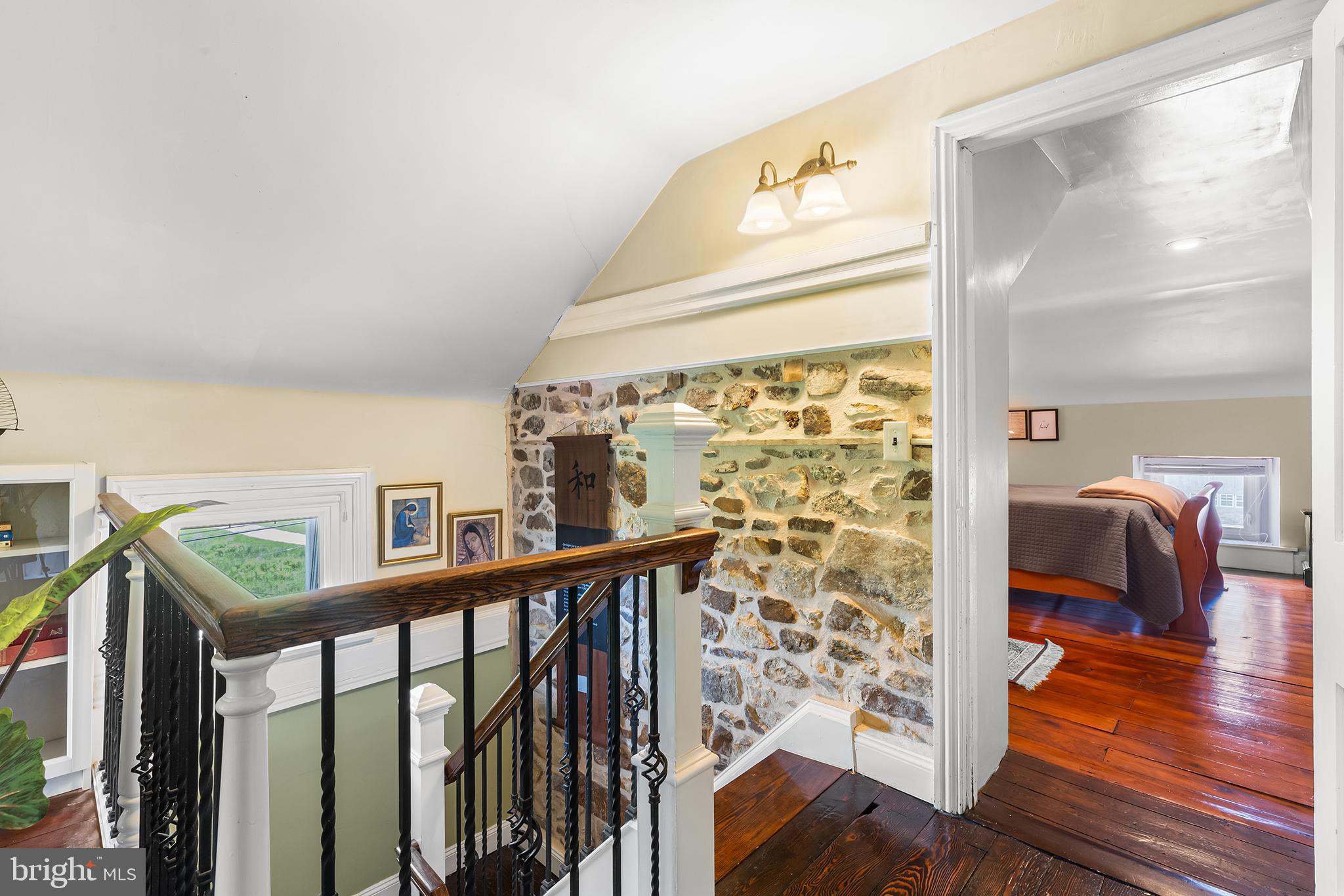 3047 Yellow Springs Road Malvern, PA 19355 - Photo 37 of 68 a view of a hallway with wooden floor windows