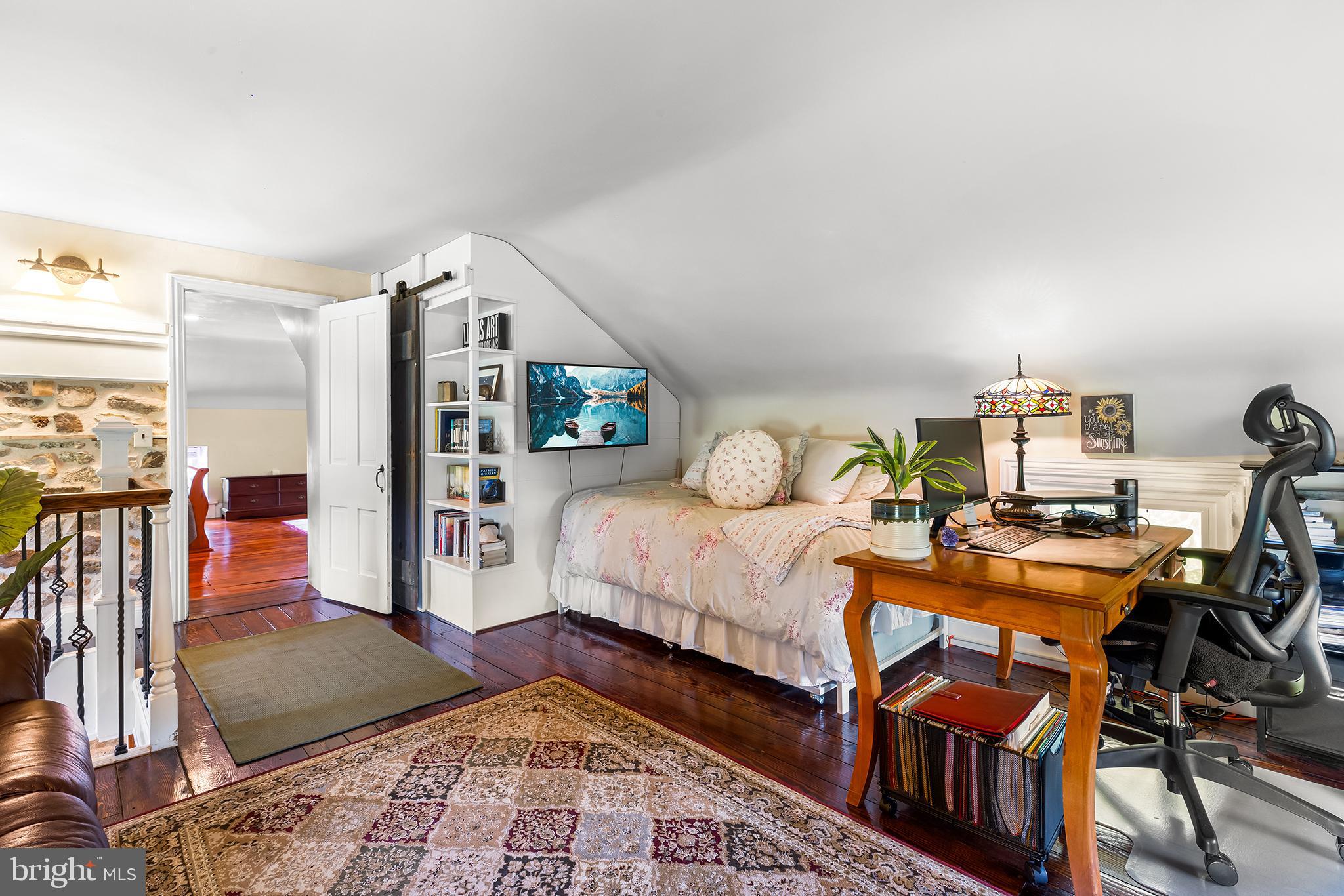 3047 Yellow Springs Road Malvern, PA 19355 - Photo 44 of 68 a bedroom with furniture and a rug