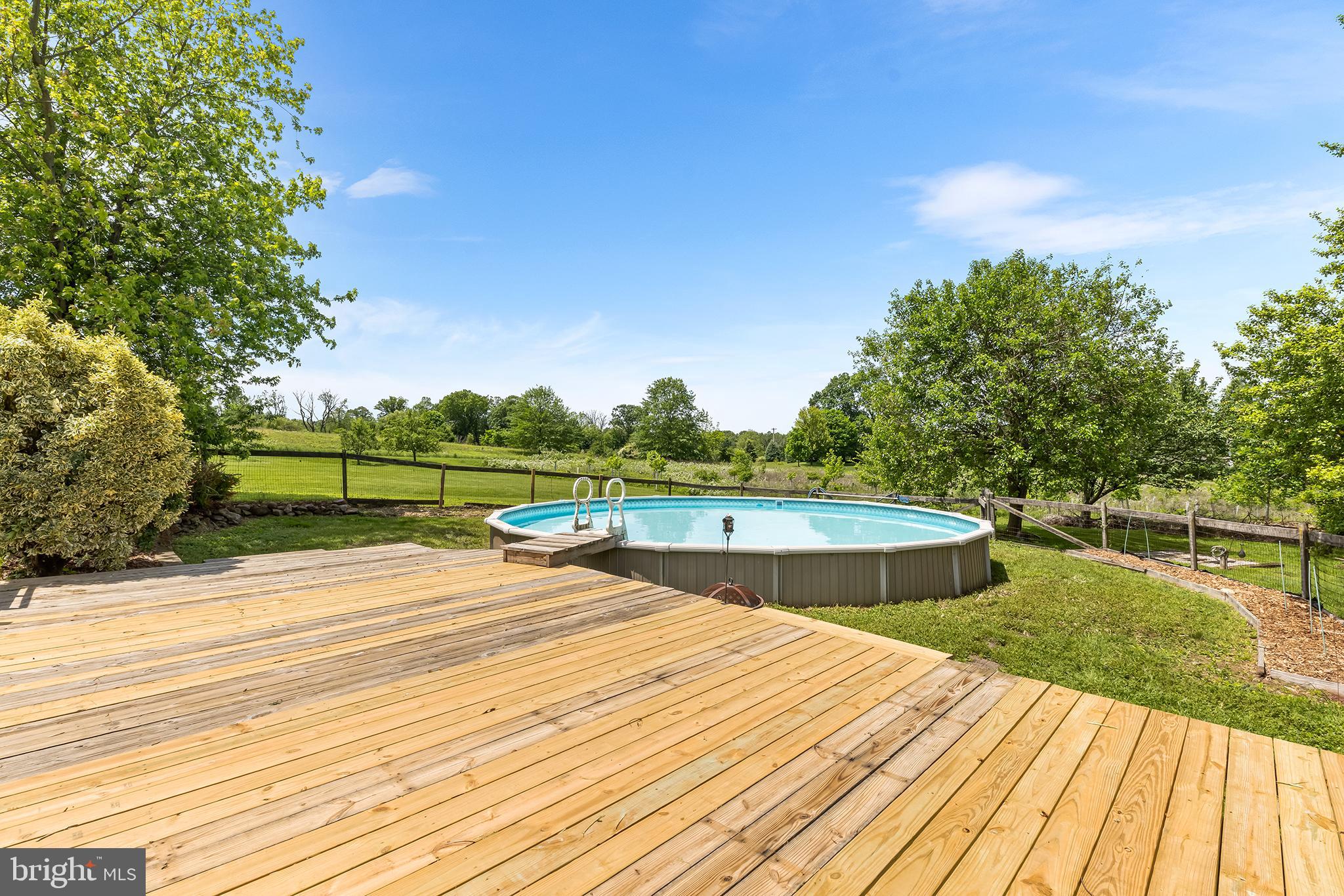 3047 Yellow Springs Road Malvern, PA 19355 - Photo 49 of 68 a view of a swimming pool with a patio
