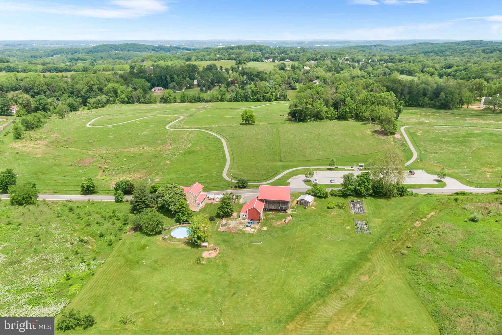 3047 Yellow Springs Road Malvern, PA 19355 - Photo 60 of 68 a view of a lake with a houses