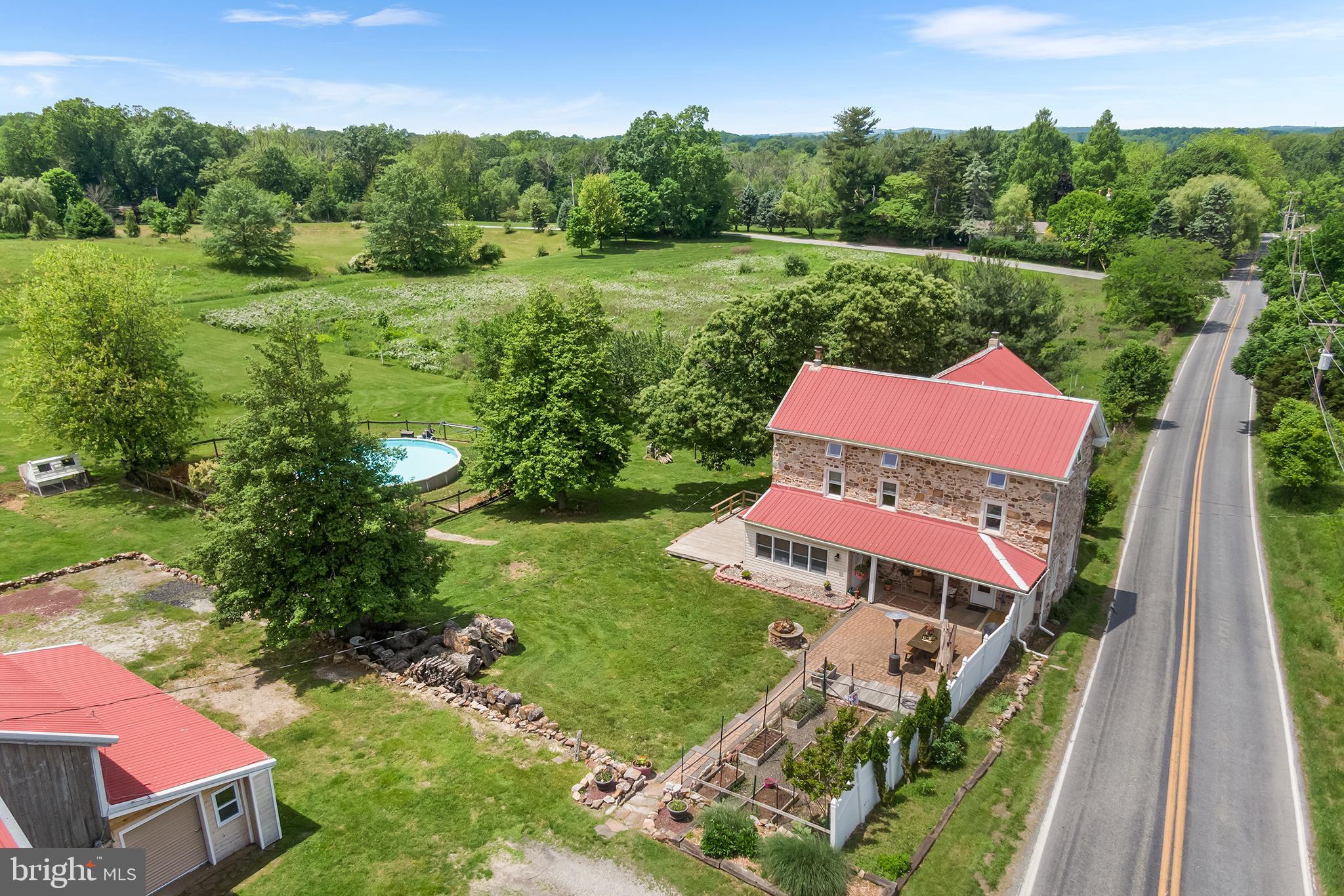 3047 Yellow Springs Road Malvern, PA 19355 - Photo 64 of 68 a view of a garden with a lake