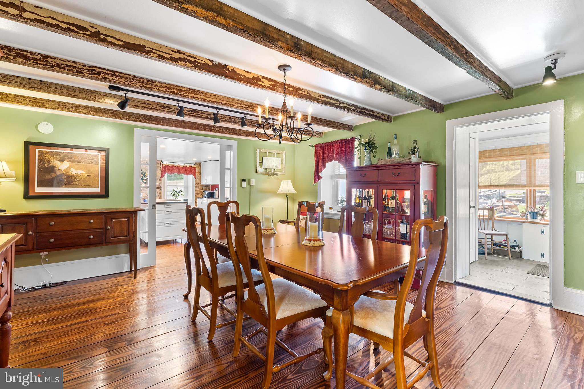 3047 Yellow Springs Road Malvern, PA 19355 - Photo 7 of 68 a view of a dining room with furniture and wooden floor