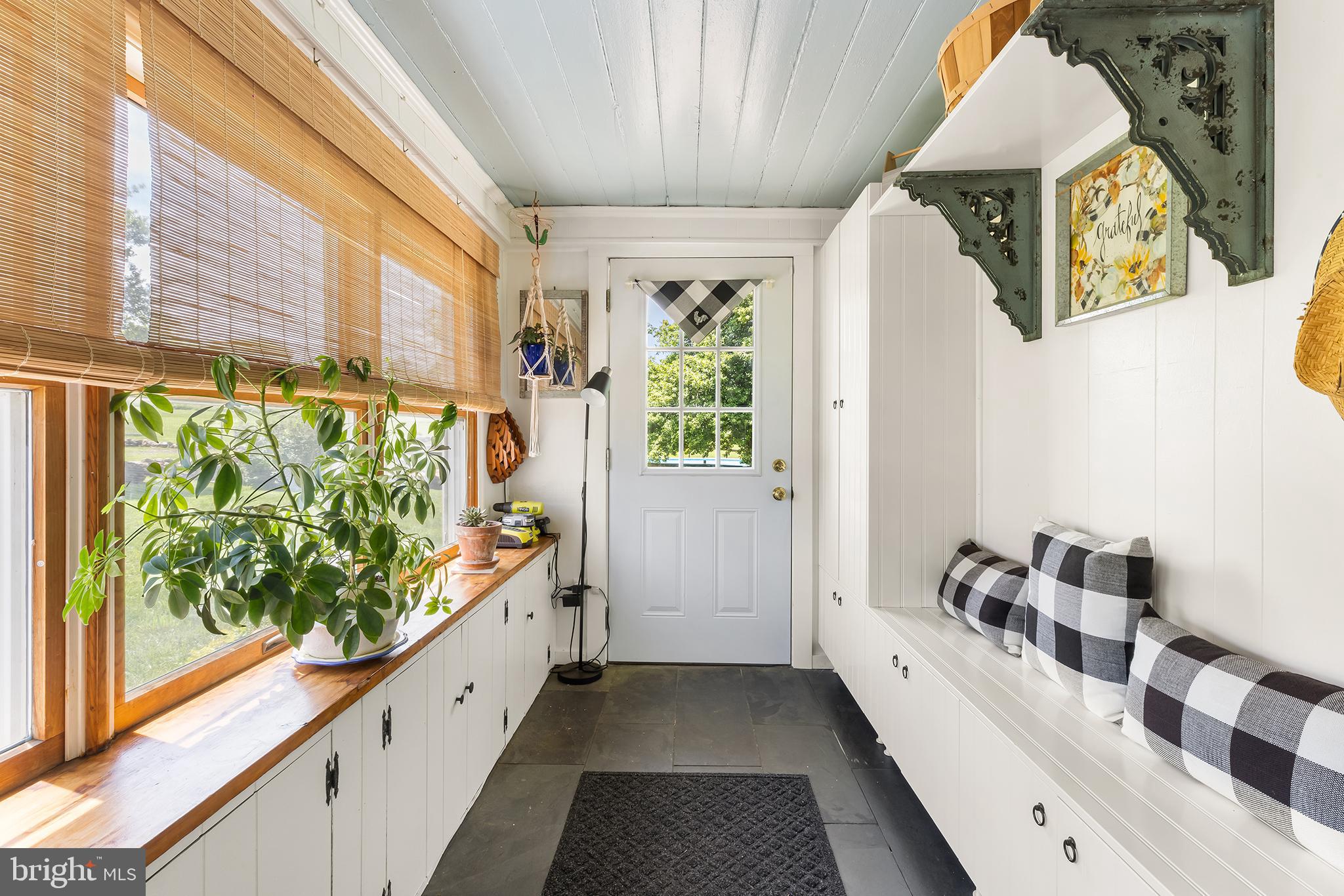 3047 Yellow Springs Road Malvern, PA 19355 - Photo 8 of 68 a bathroom with a bathtub and a window