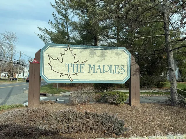 a sign on the side of a road