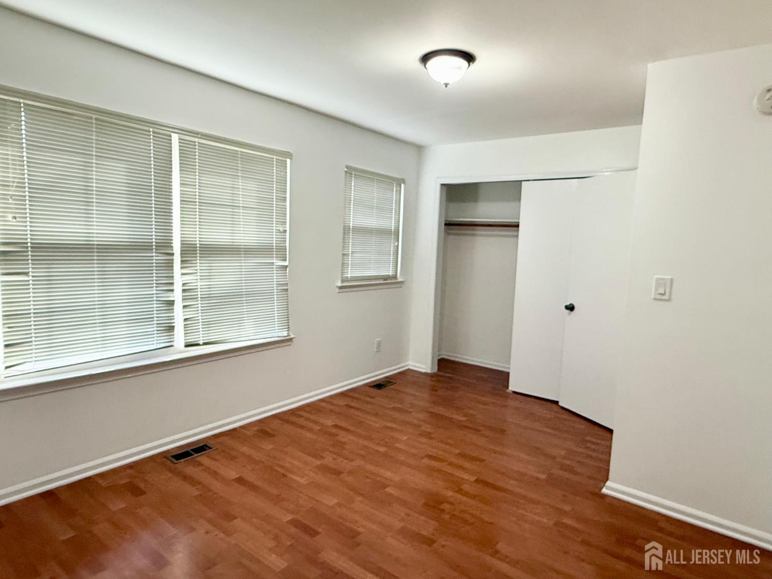 405 Maplecrest Road Edison, NJ 08820 - Photo 12 of 13 an empty room with a window