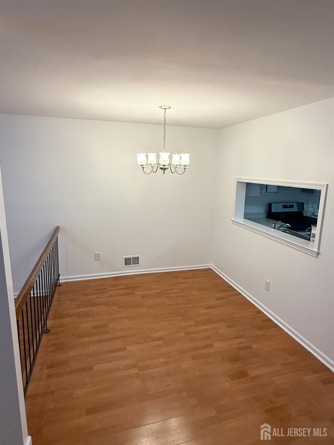 405 Maplecrest Road Edison, NJ 08820 - Photo 10 of 13 a view of a room with an empty space