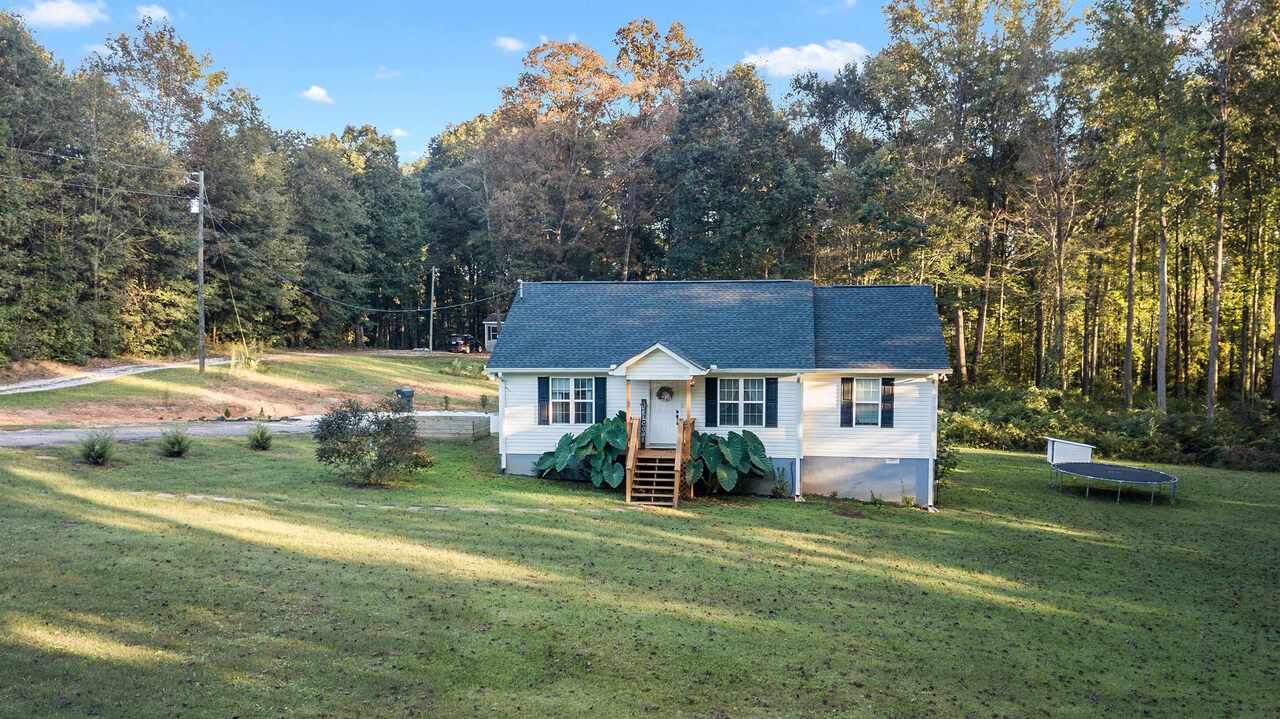 164 Kathryn Way Commerce, GA 30530 - Photo 1 of 1 a front view of a house with a yard