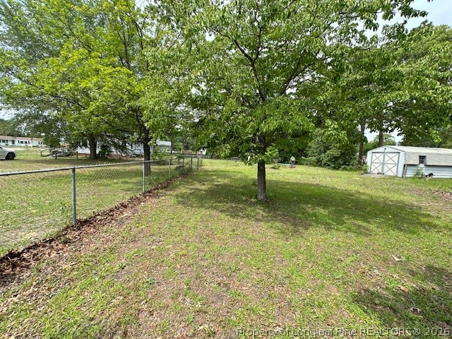 5716 Camden Road Fayetteville, NC 28306 - Photo 3 of 10 a view of a trees with a yard